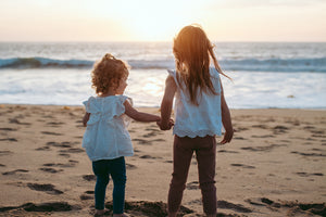 Two young girls on the beach